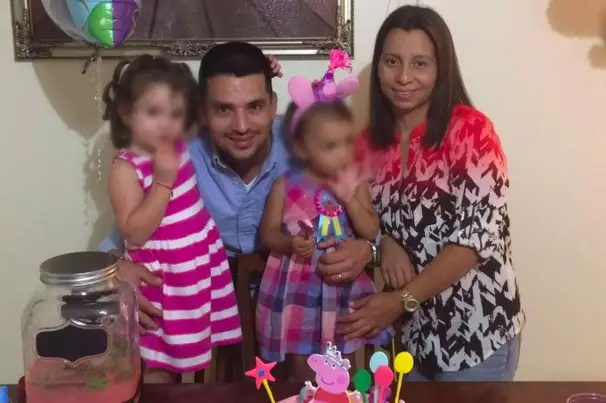 Villavicencio with his wife and two daughters, ages 2 and 3.
